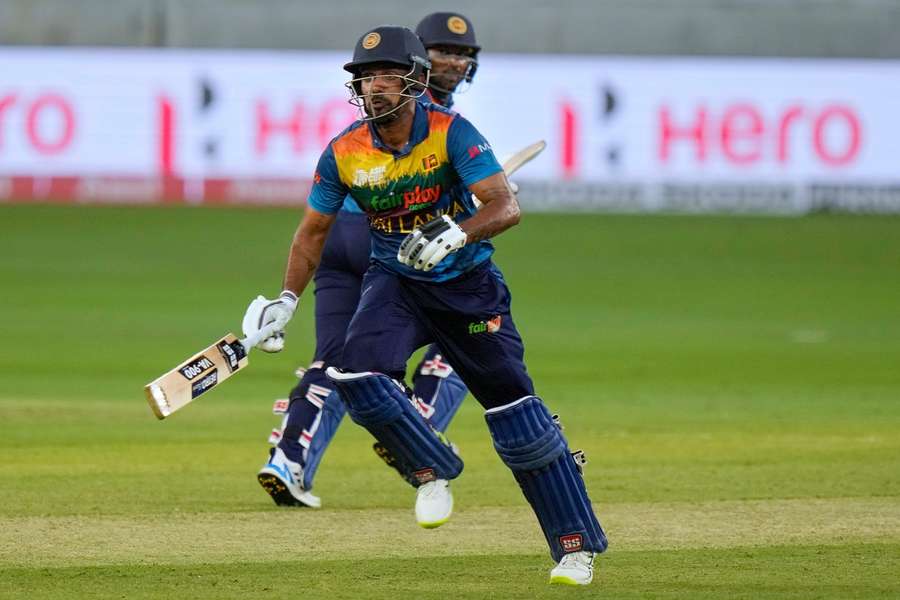 Danushka Gunathilaka runs between the stumps for Sri Lanka