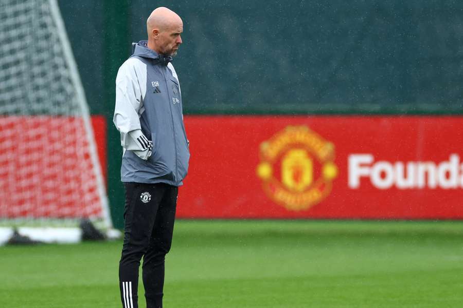 Erik ten Hag looks on during training at Carrington