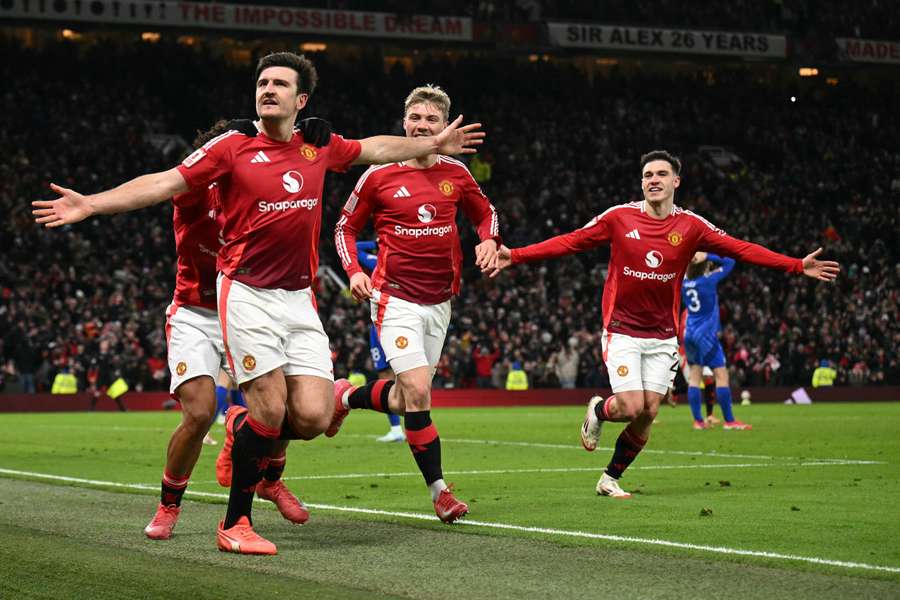 Les Mancuniens célébrant le but de la qualification.