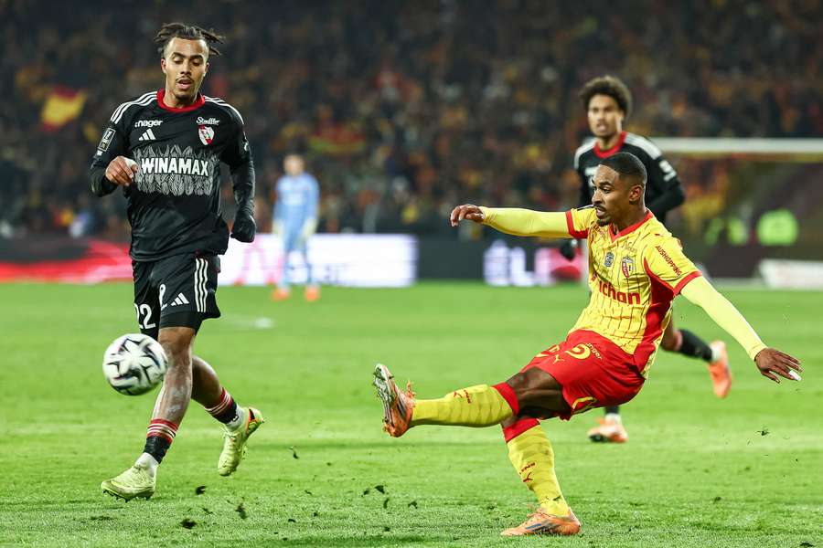 Wesley Said (right) in action for Lens