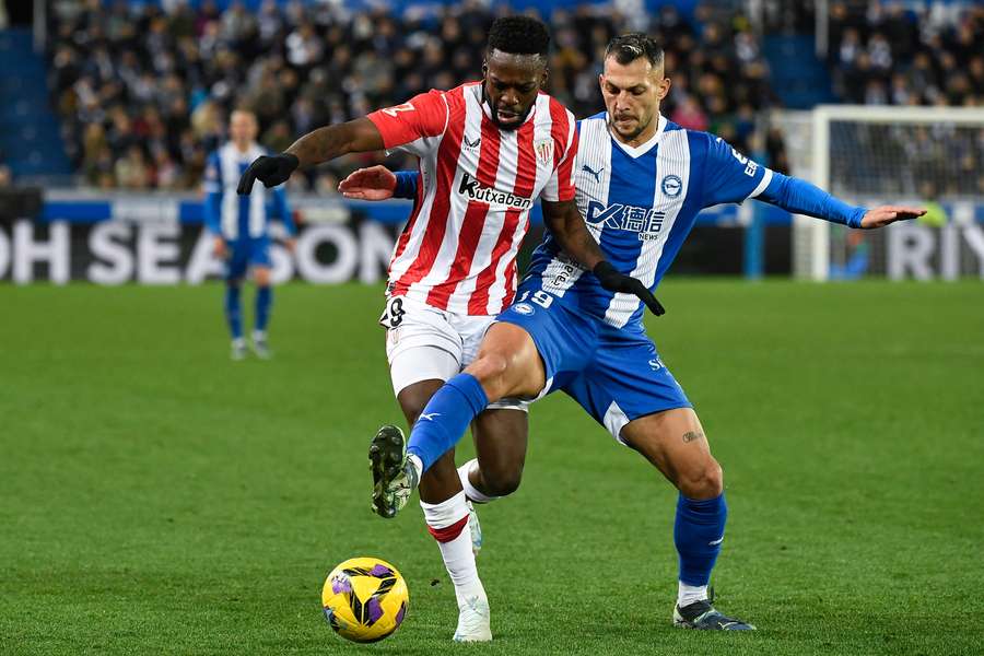 Athletic Club's Inaki Williams (left) battling for the ball