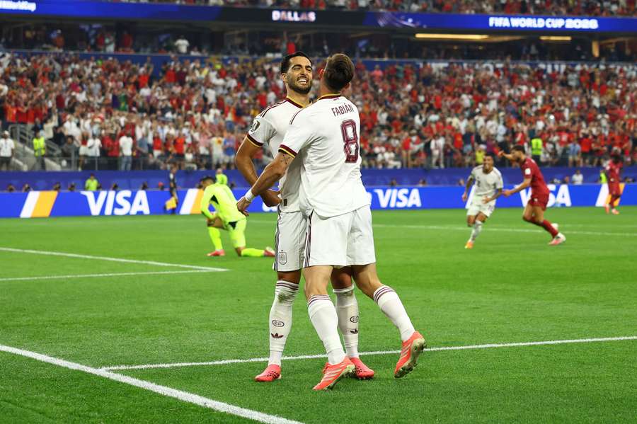 Spain's Mikel Merino celebrates scoring their first goal with Fabian Ruiz Spain's Mikel Merino celebrates scoring their first goal with Fabian Ruiz