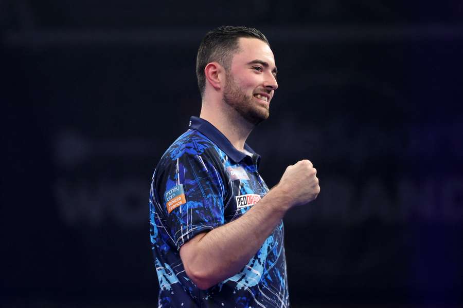 Luke Humphries reacts to winning his quarter-finals match against Jonny Clayton