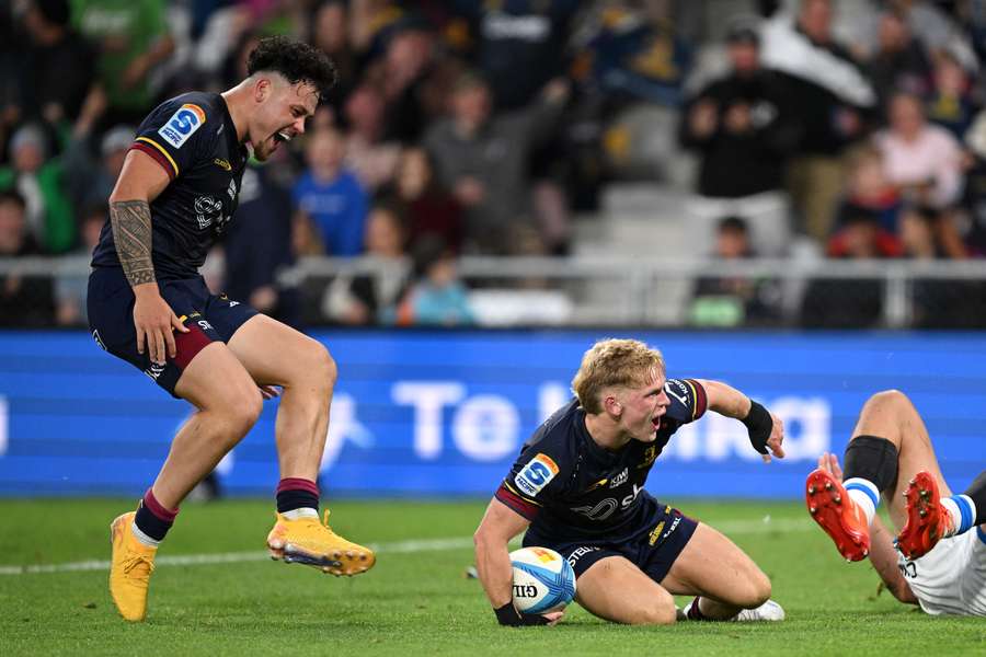 Finn Hurley celebrates one of his two tries scored in the 29-21 victory.