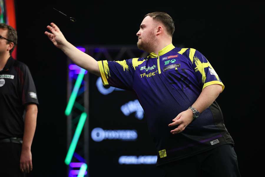 Littler beat Sedlacek to begin his title defence Littler beat Sedlacek to begin his title defence