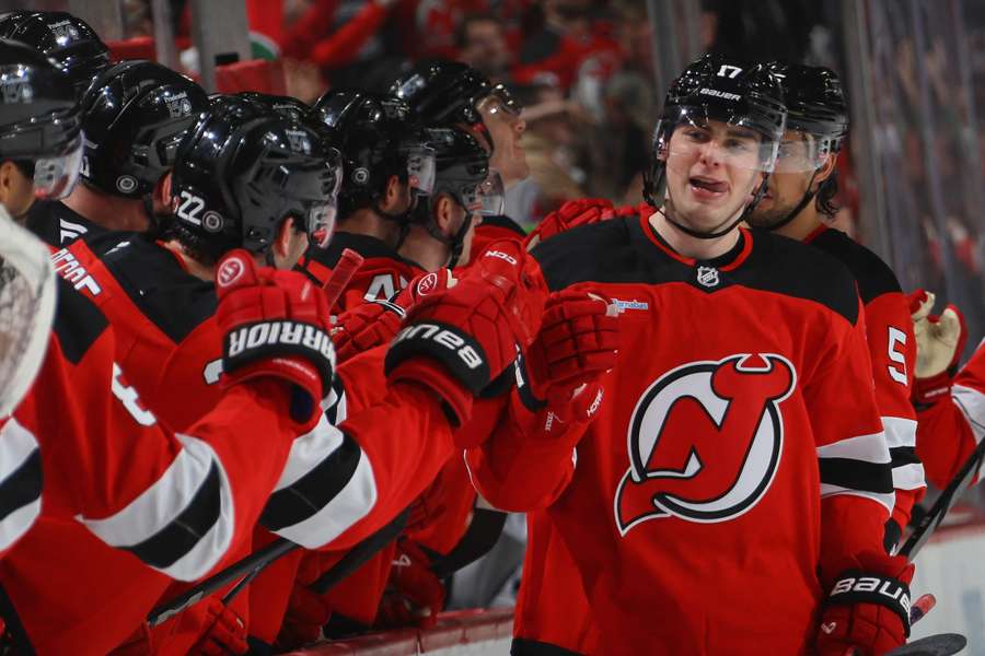 New Jersey Devils players celebrating Simon Nemec's game-winning goal against the Edmonton Oilers (2025)