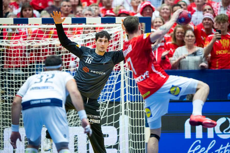 Italys goalkeeper Andrea Colleluori attempts to save a free trrow from Denmarks Emil Jakobsen