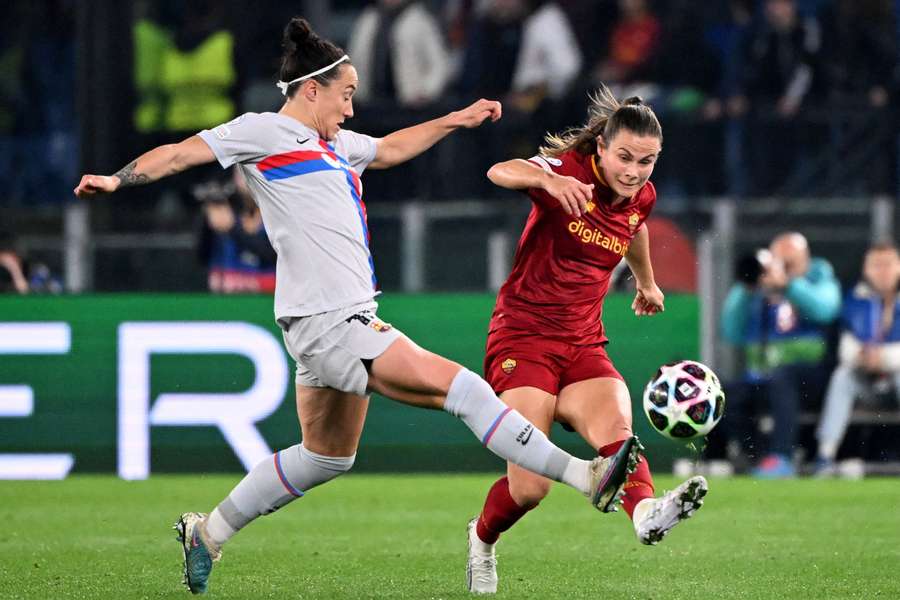Emilie Haavi, right, in action for Roma