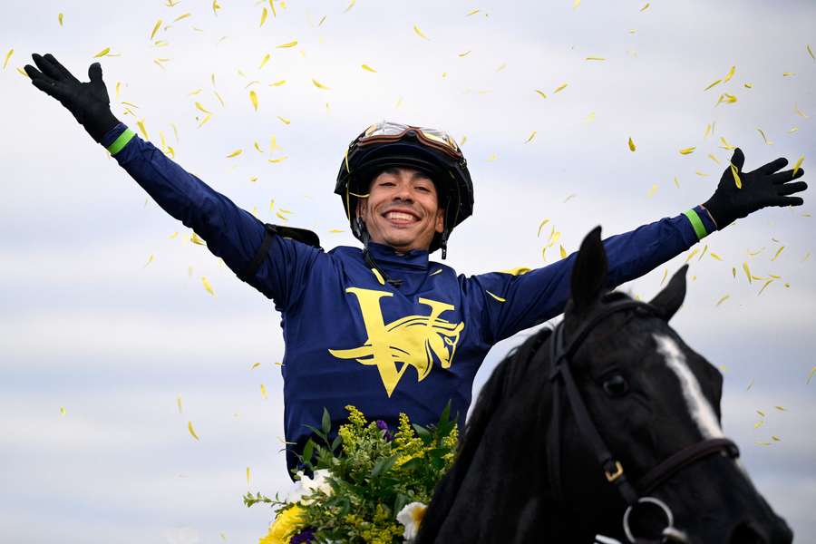 Jockey Flavien Prat celebrates in confetti glory as Sierra Leone wins the Breeders' Cup Classic