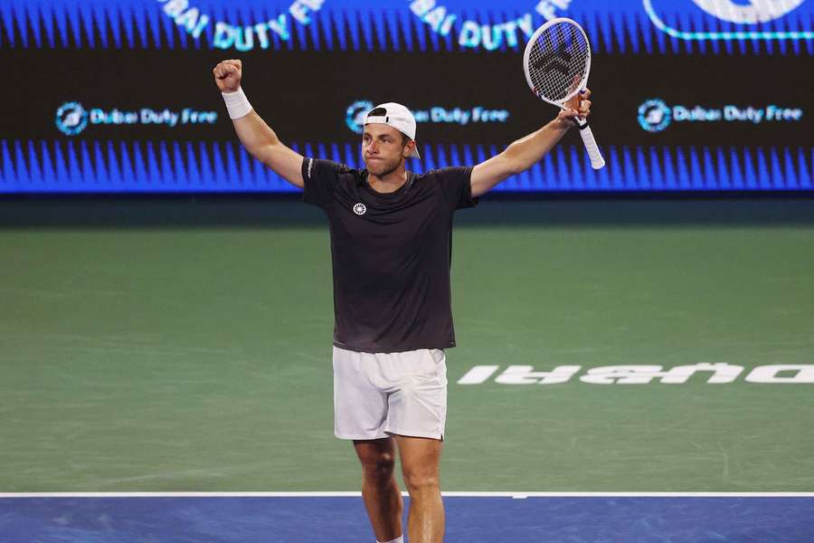 Tallon Griekspoor celebrates beating Alexander Bublik in Dubai