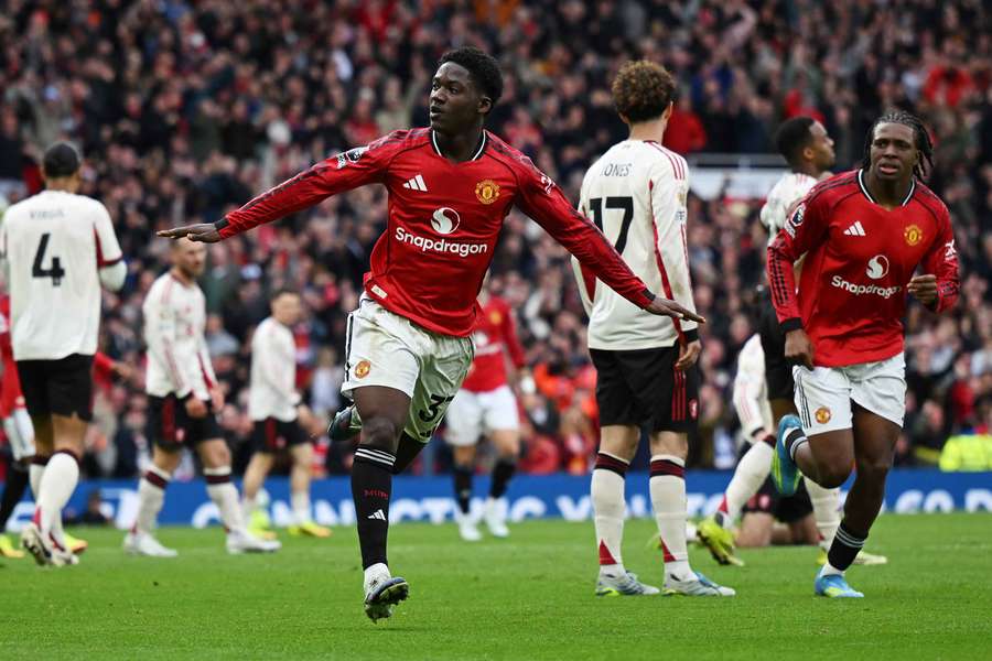 Kobbie Mainoo celebrates after scoring the winner against Liverpool at Old Trafford