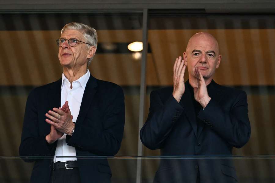 Arsene Wenger next to FIFA President Gianni Infantino Arsene Wenger next to FIFA President Gianni Infantino
