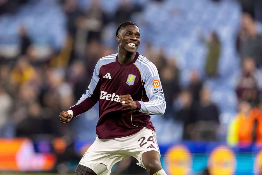 Aston Villa midfielder Amadou Onana celebrates after the win vs Lille