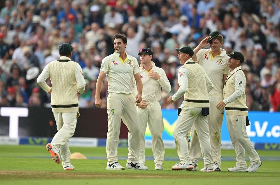 Australia celebrate snaring two wickets