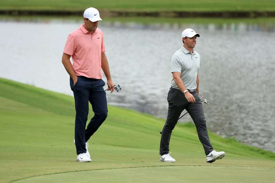 Scheffler (L) and McIlroy will tee off together at the Masters