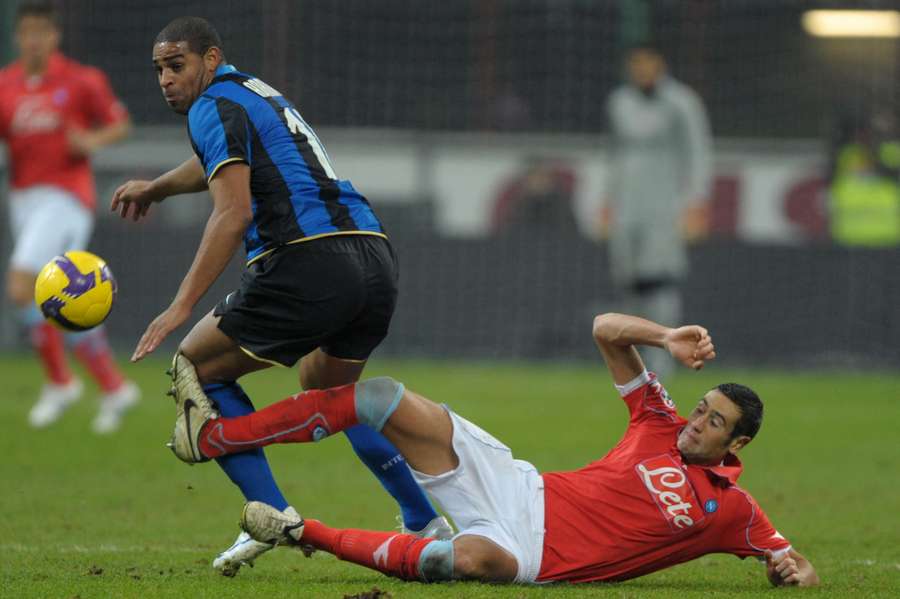 Rinaudo tackles Adriano Rinaudo tackles Adriano