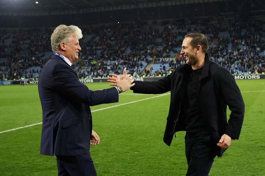 Frank Lampard celebrates winning the Championship title with the Coventry chairman