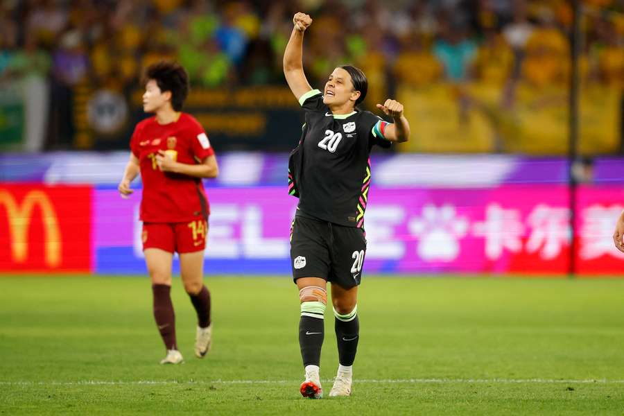Sam Kerr celebrates against China