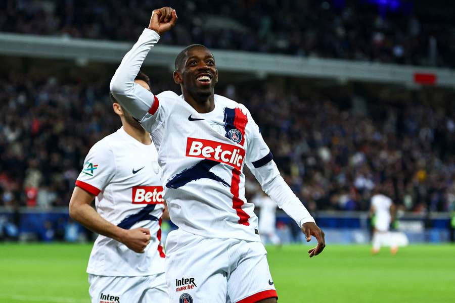 Paris Saint-Germain's French forward #10 Ousmane Dembele celebrates after scoring his team's fourth goal 