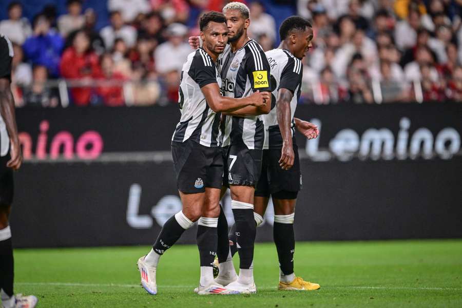 Murphy (l) celebrates a Newcastle win