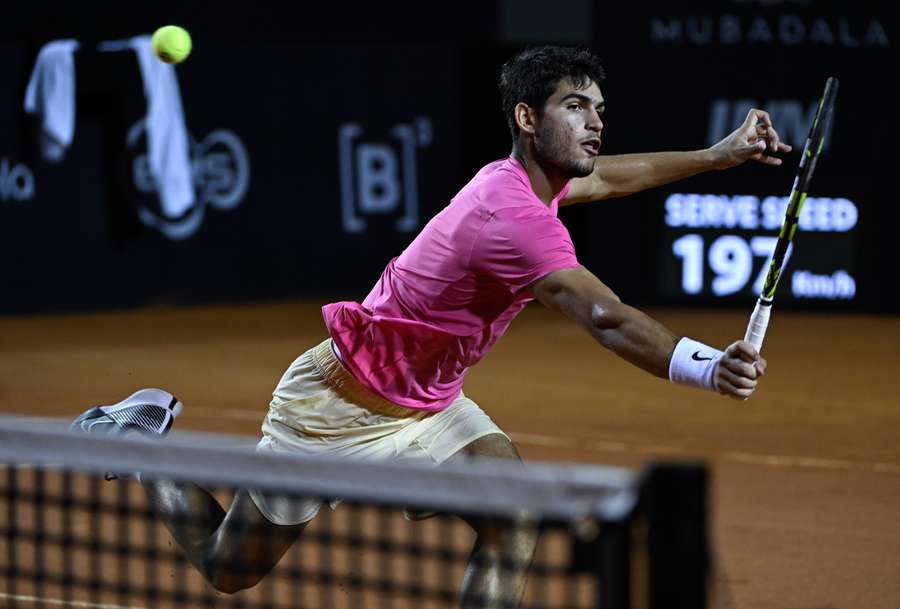 Spain's Carlos Alcaraz returns the ball