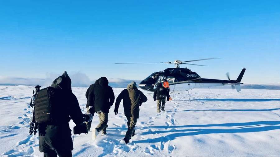 Helicopters helping players off a Scottish mountain during a snowstorm