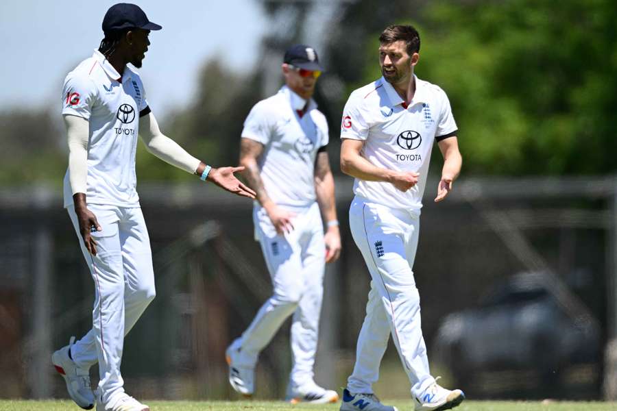 Jofra Archer and Mark Wood chat during England's Ashes warm-up game at Lilac Hill in Perth