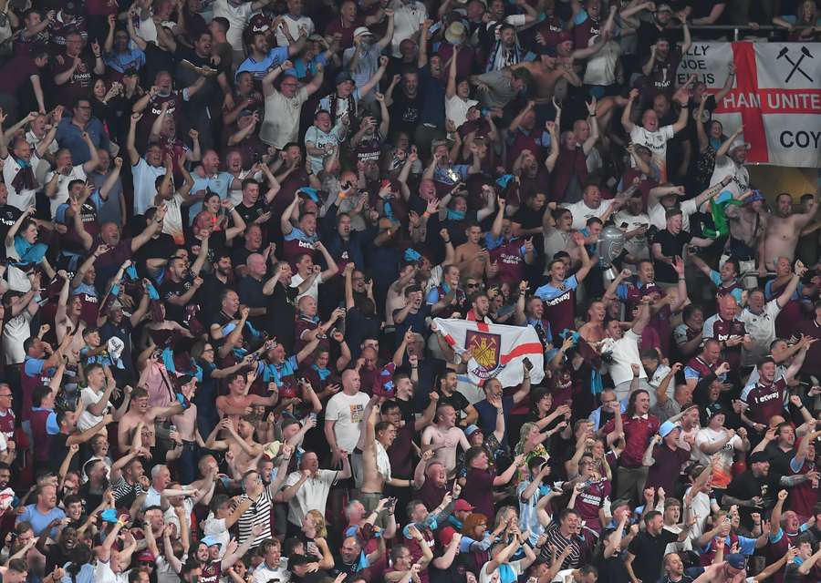 West Ham fans celebrate their last-minute goal