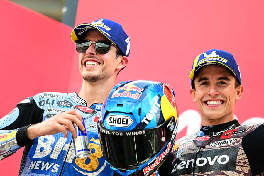 Alex (L) and Marc Marquez alongside each other