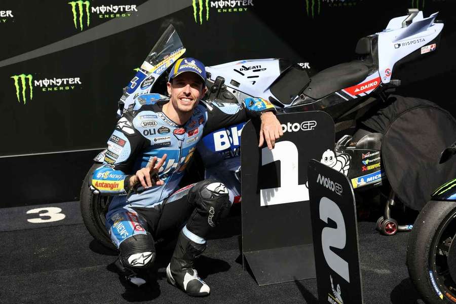 Alex Marquez celebrates his pole position