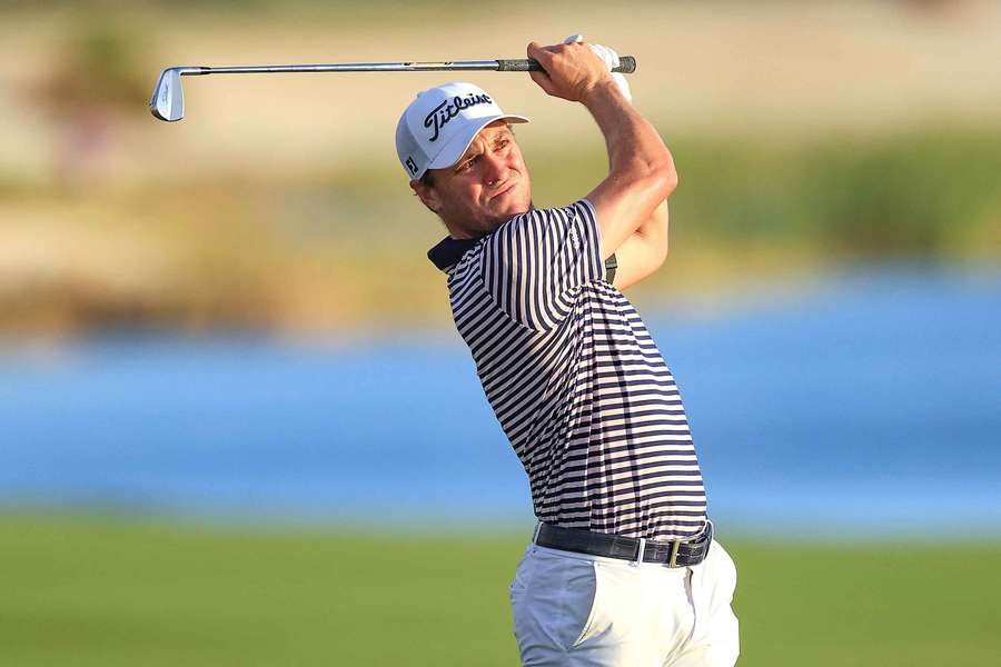 Justin Thomas plays his second shot on the 18th hole during the third round of the Hero World Challenge