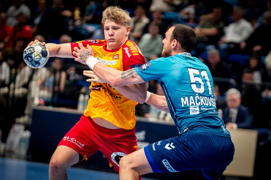 Emil Tonnesen of GOG (L) in action against Borut Mackovsek of Szeged during the Champions’ League Men’s handball match 
