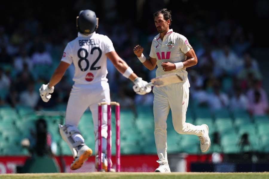 Mitchell Starc celebrates dismissing Jacob Bethell on day five in Sydney. Mitchell Starc celebrates dismissing Jacob Bethell on day five in Sydney.
