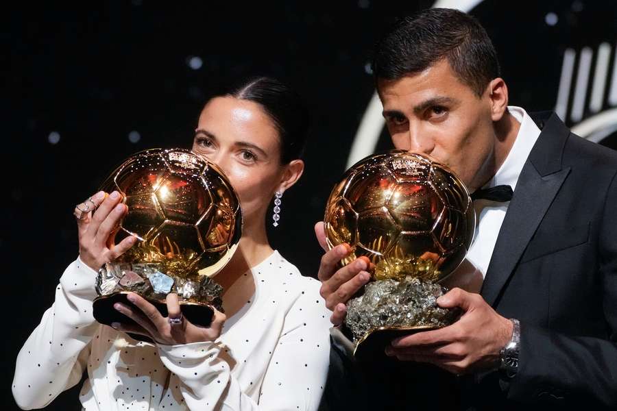 Spain's Aitana Bonmati (L) and Rodri with their Ballons d'Or