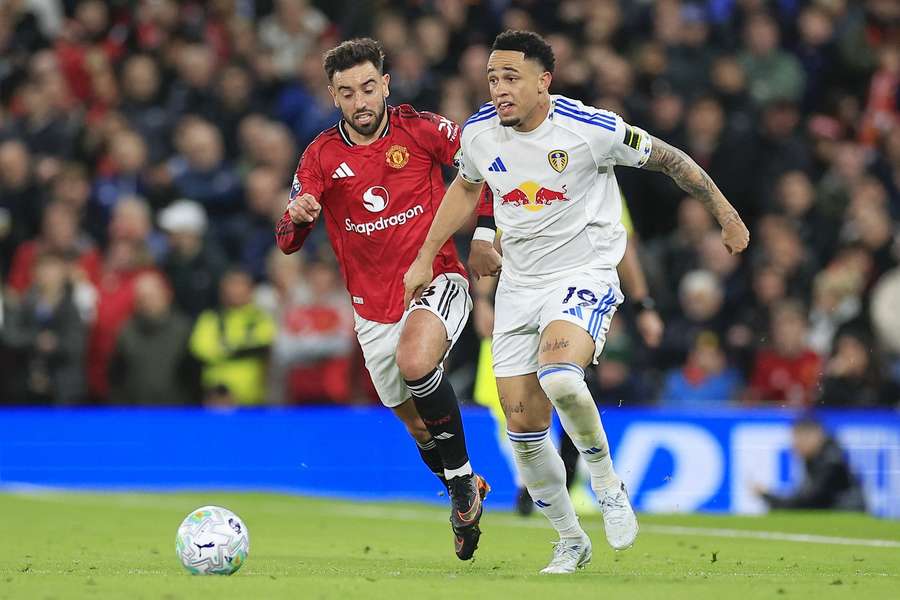 Leeds' Noah Okafor and Man Utd's Bruno Fernandes challenge for the ball Leeds' Noah Okafor and Man Utd's Bruno Fernandes challenge for the ball