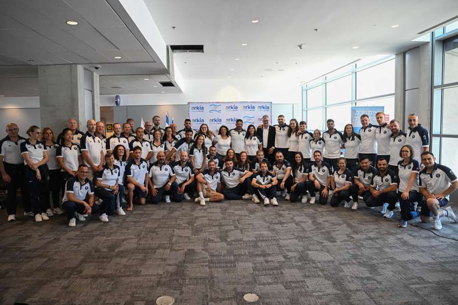 Members of Israel's delegation to the Paris 2024 Olympic and Paralympic Games pose for a group picture ahead of departure