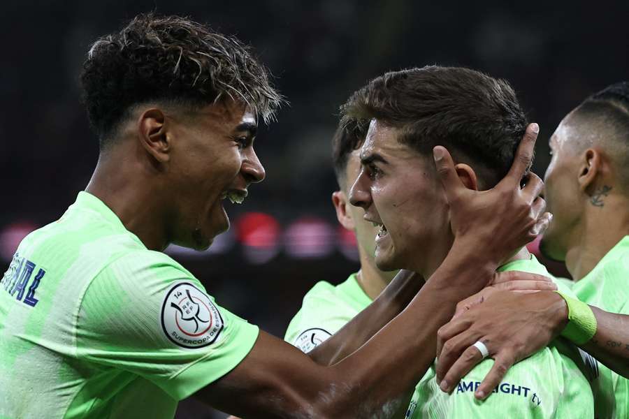 Barcelona's Gavi (right) celebrates with Lamine Yamal after scoring his team's first goal during the Spanish Super Cup semi-final