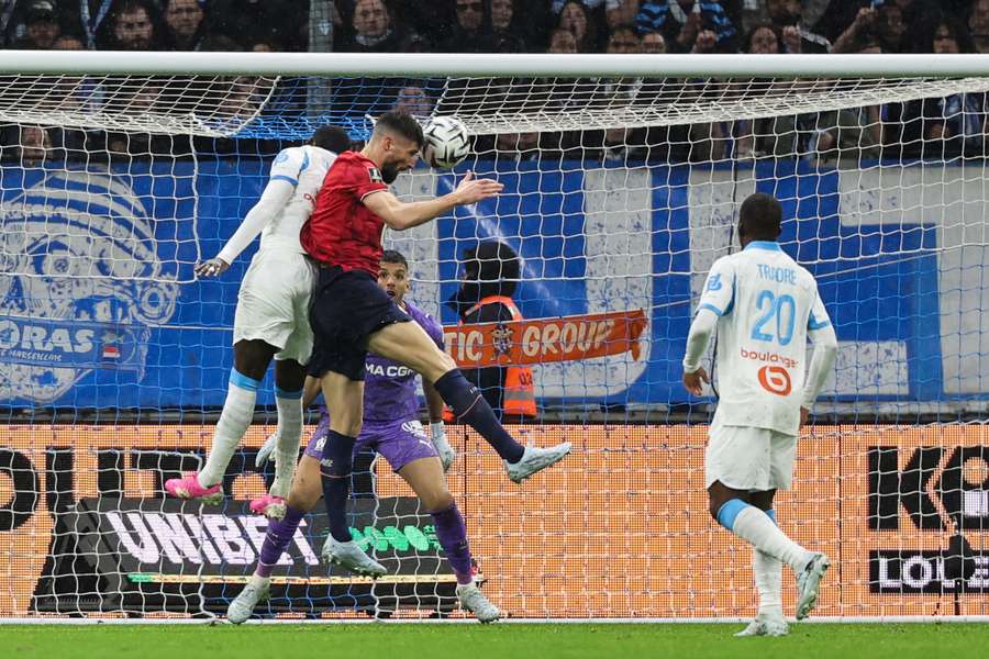 Olivier Giroud scores a header for Lille Olivier Giroud scores a header for Lille