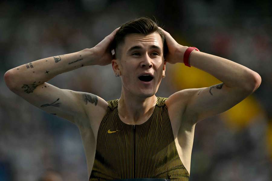 Norway's Jakob Ingebrigtsen reacts after setting a new world record in the men's 3000m event