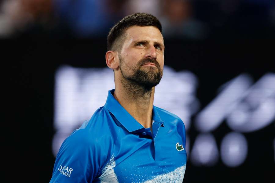 Novak Djokovic reacts after a point against Tomas Machac at the Australian Open