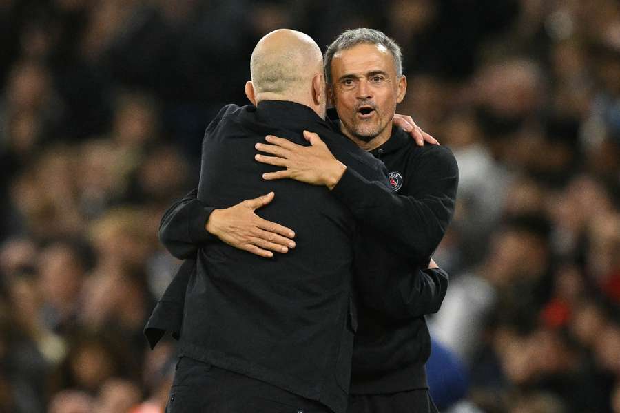 Luis Enrique (right) embraces Maresca after the match