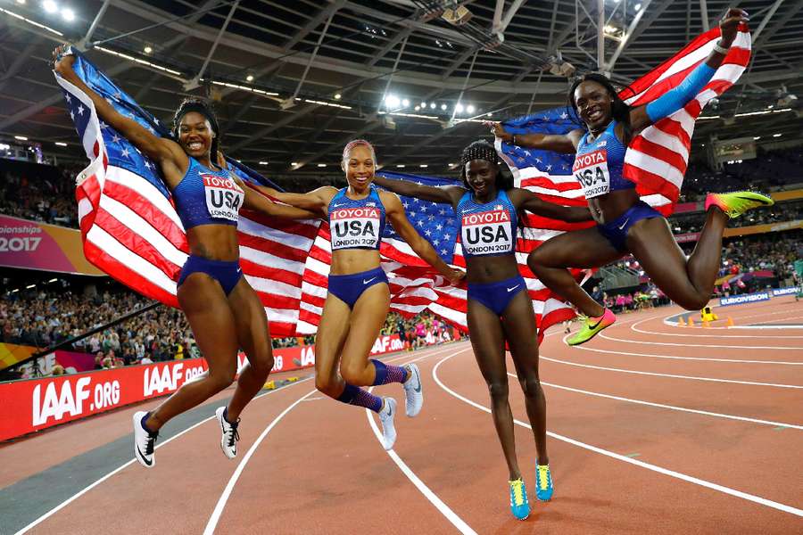 Brown, Felix, Akinosun and Bowie celebrate winning the women's 4x100 metres relay at the World Athletics Championships in 2017