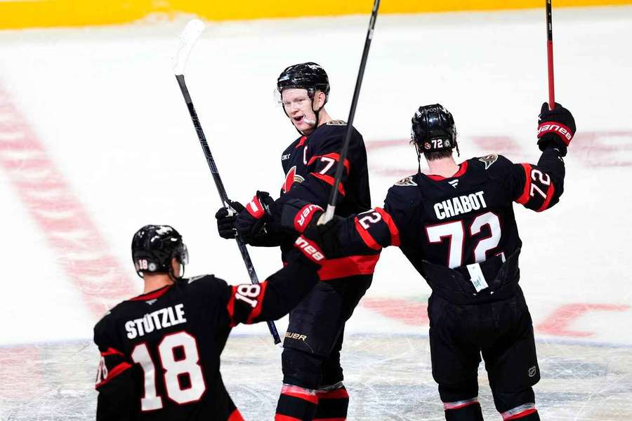 The Senators celebrate their late winner