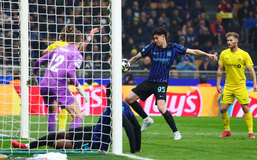 Inter Milan's Alessandro Bastoni scores their first goal