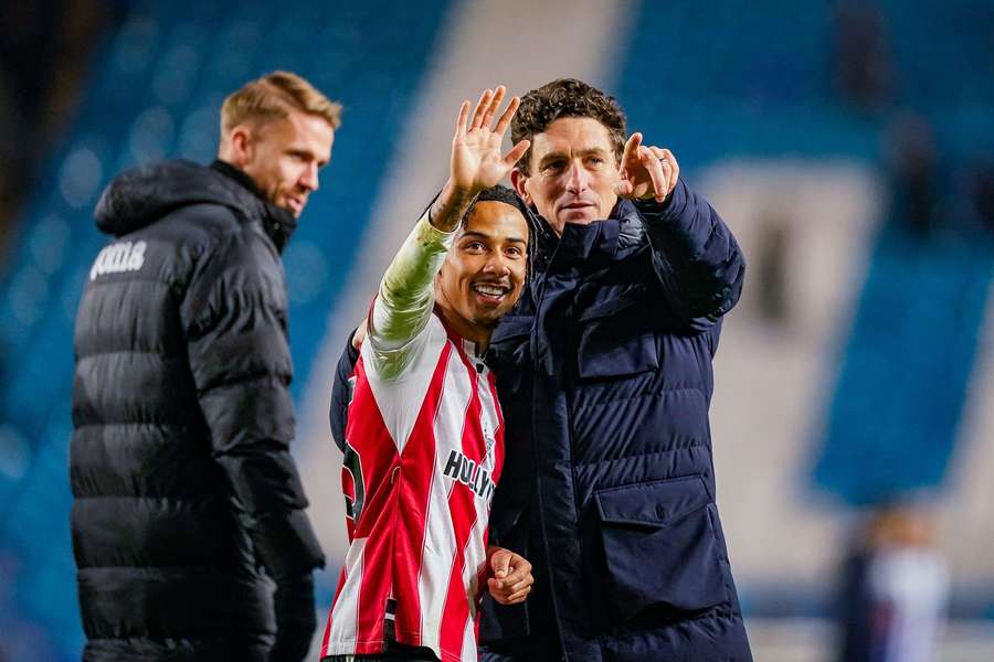 Andrews (R) and Donova (middle) celebrate Brentford's win