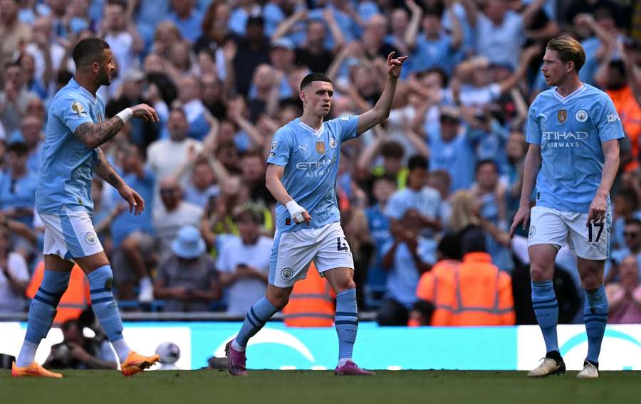 Manchester City's English midfielder #47 Phil Foden celebrates scoring his, and the team's, second goal