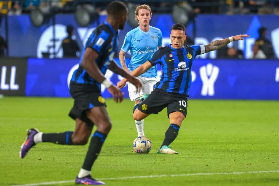 Lautaro Martinez shoots the ball during the Italian Super Cup semi-final