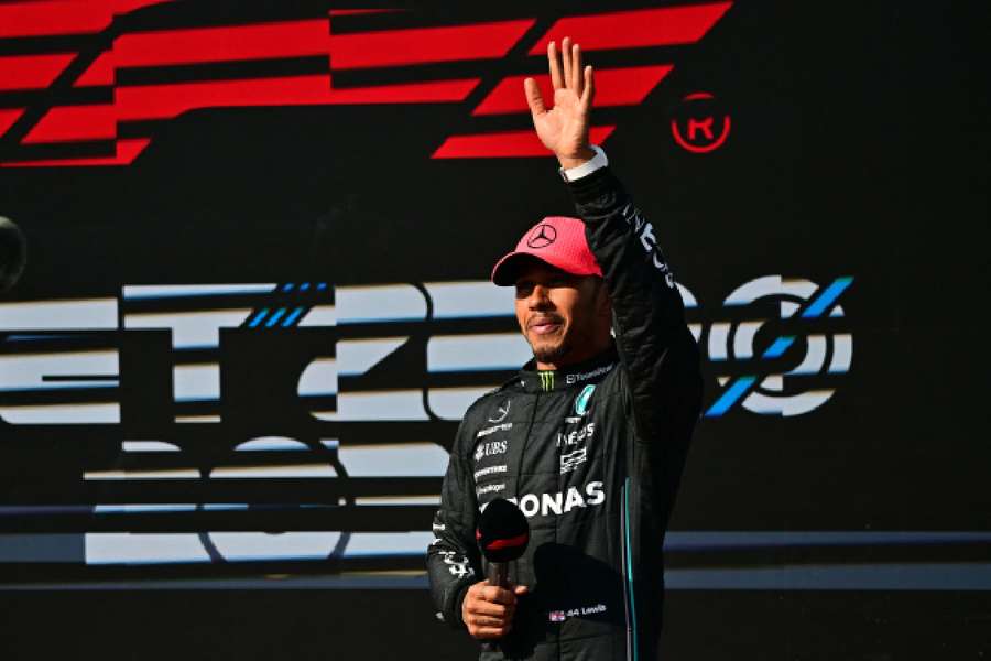 Mercedes' Lewis Hamilton celebrates after qualifying in pole position