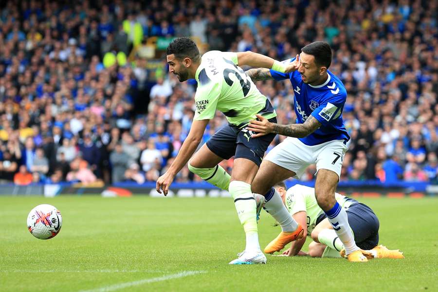 Manchester City's Riyad Mahrez vies with Everton's Dwight McNeil