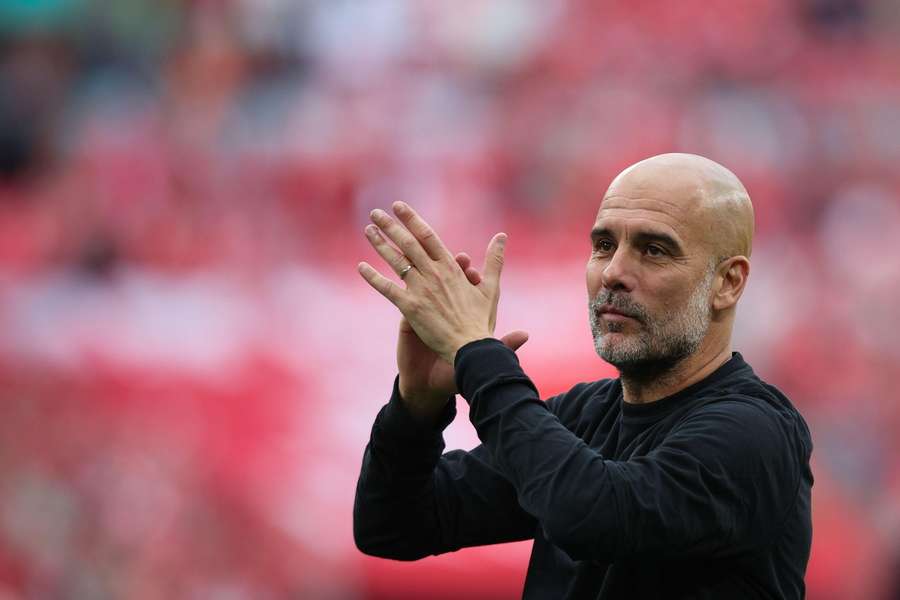 Manchester City manager Pep Guardiola acknowledges the fans after the FA Cup semi-final against Nottingham Forest